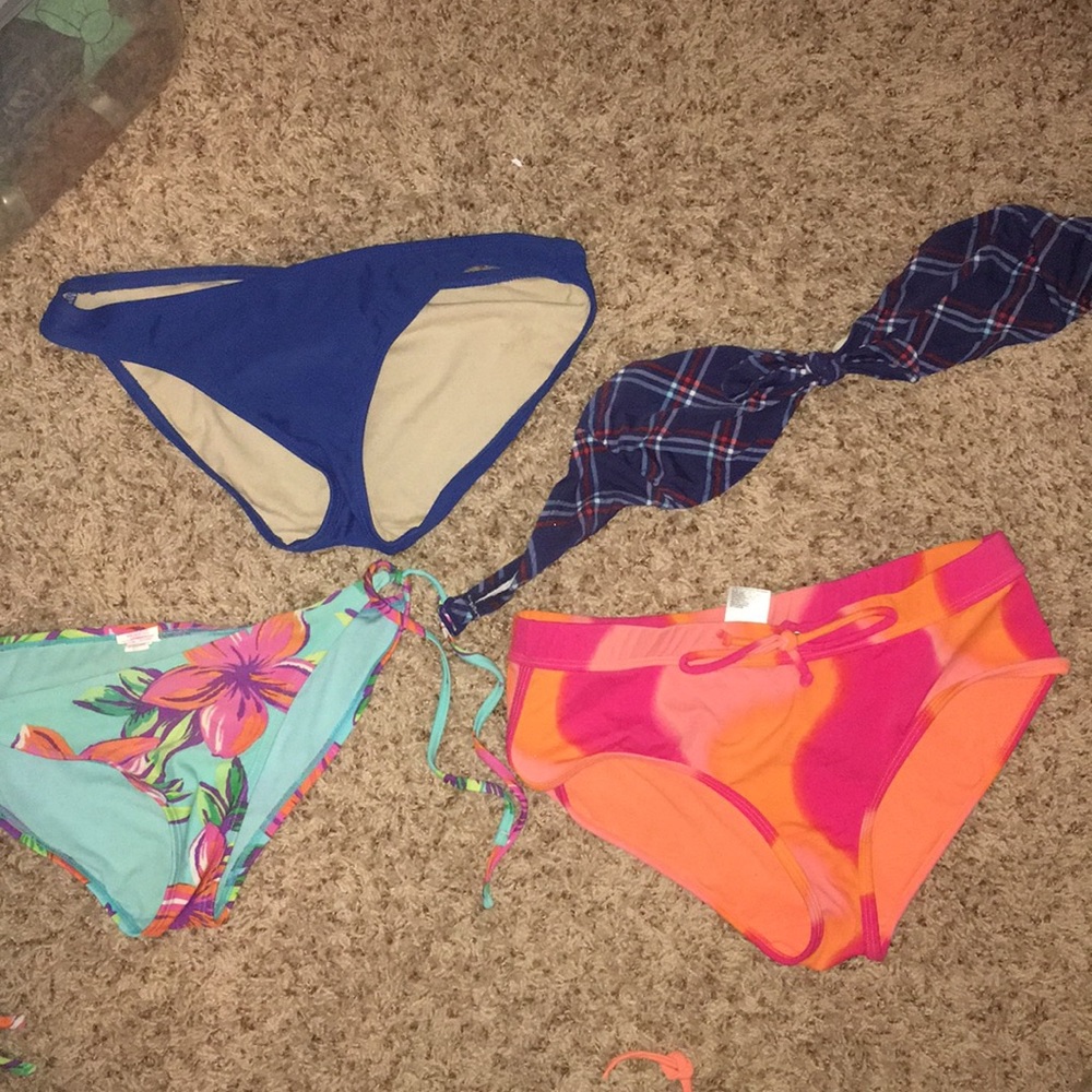 3 bathing suit bottoms and one top